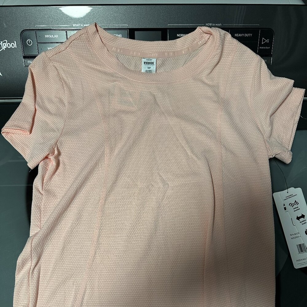 REEBOK womans Size S ribbed sport top.  Pinkish/coral color.  Brand NEW